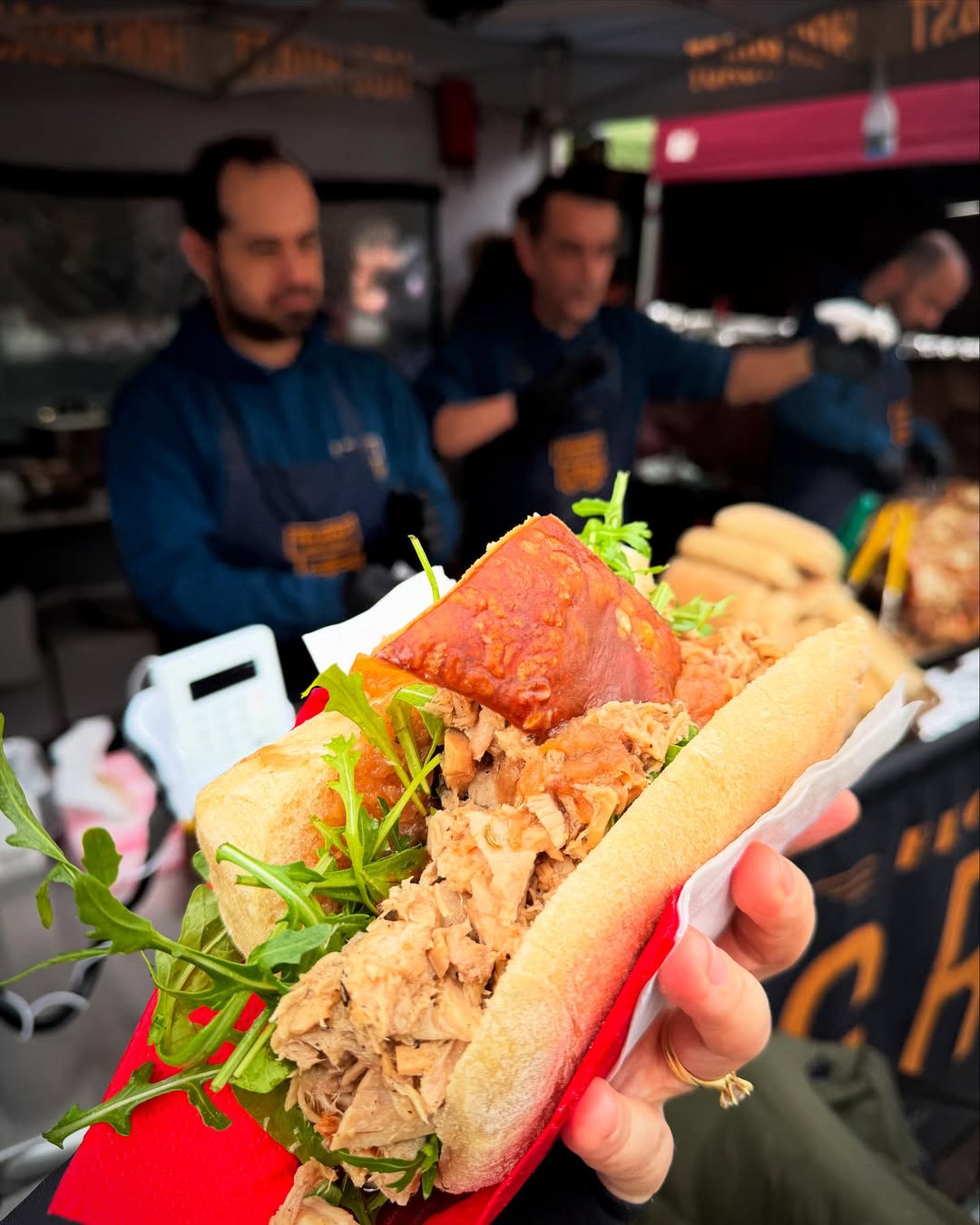 Chicken escalope wrap with hummus, chilli sauce and salads at Broadway market