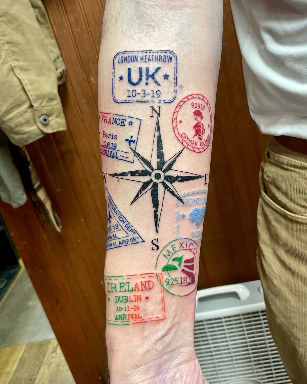 Passport stamp tattoo
