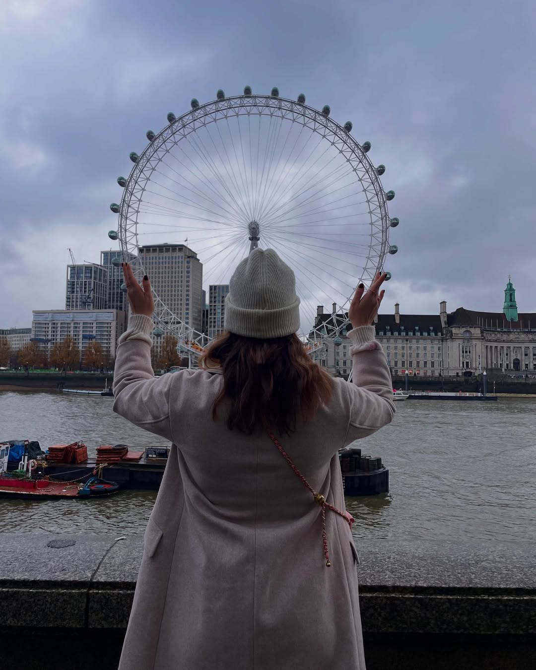 Knit sweater under a long wool coat works wonders