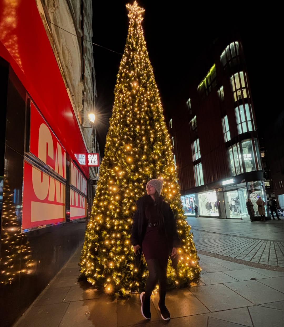 Layered outfit with weatherproof coat