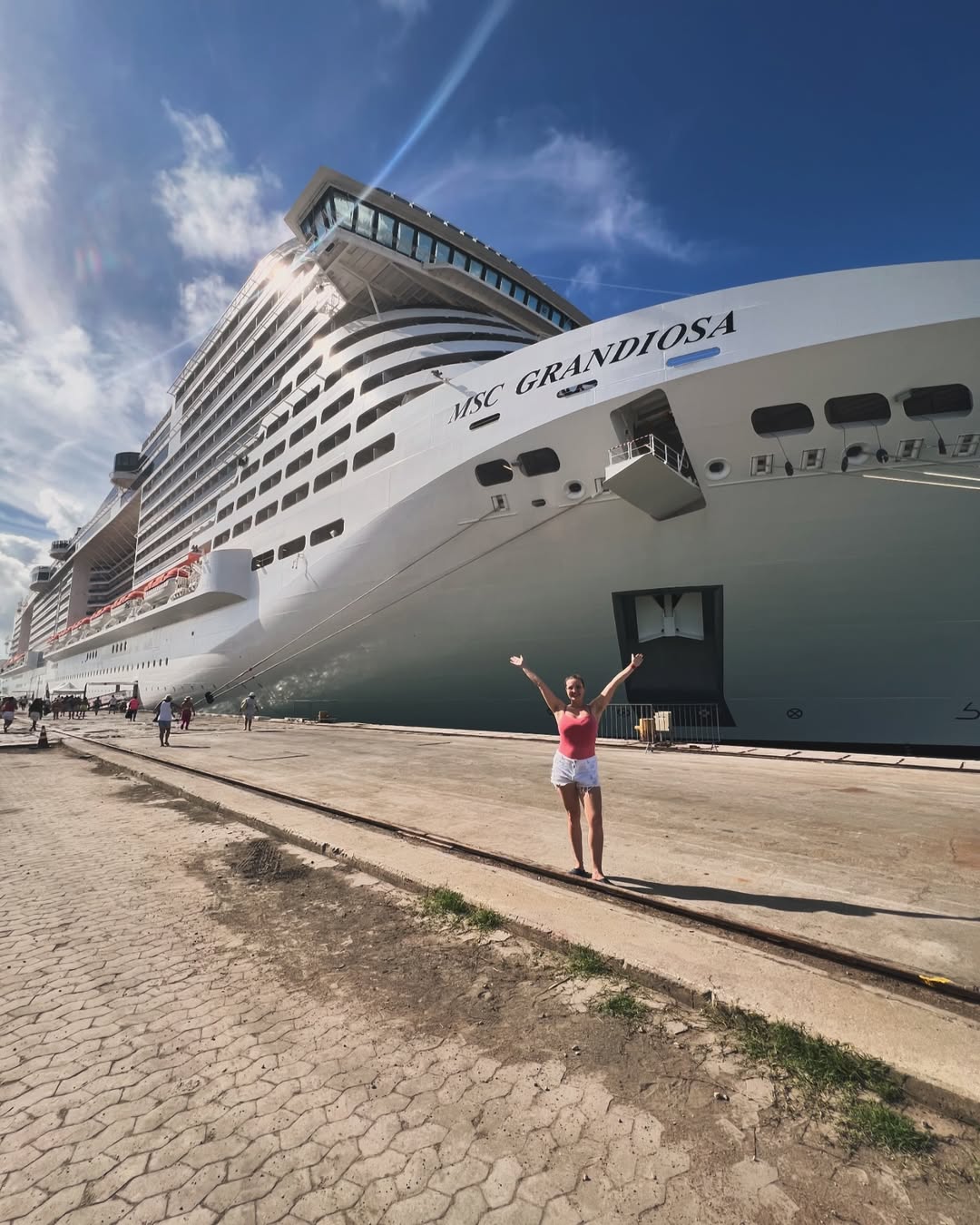 Taking photos with cruise in backdrop is always an epic cruise photo idea