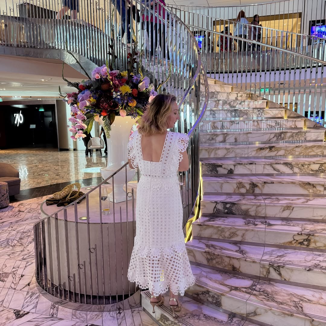 White crochet midi dress with flutter sleeves