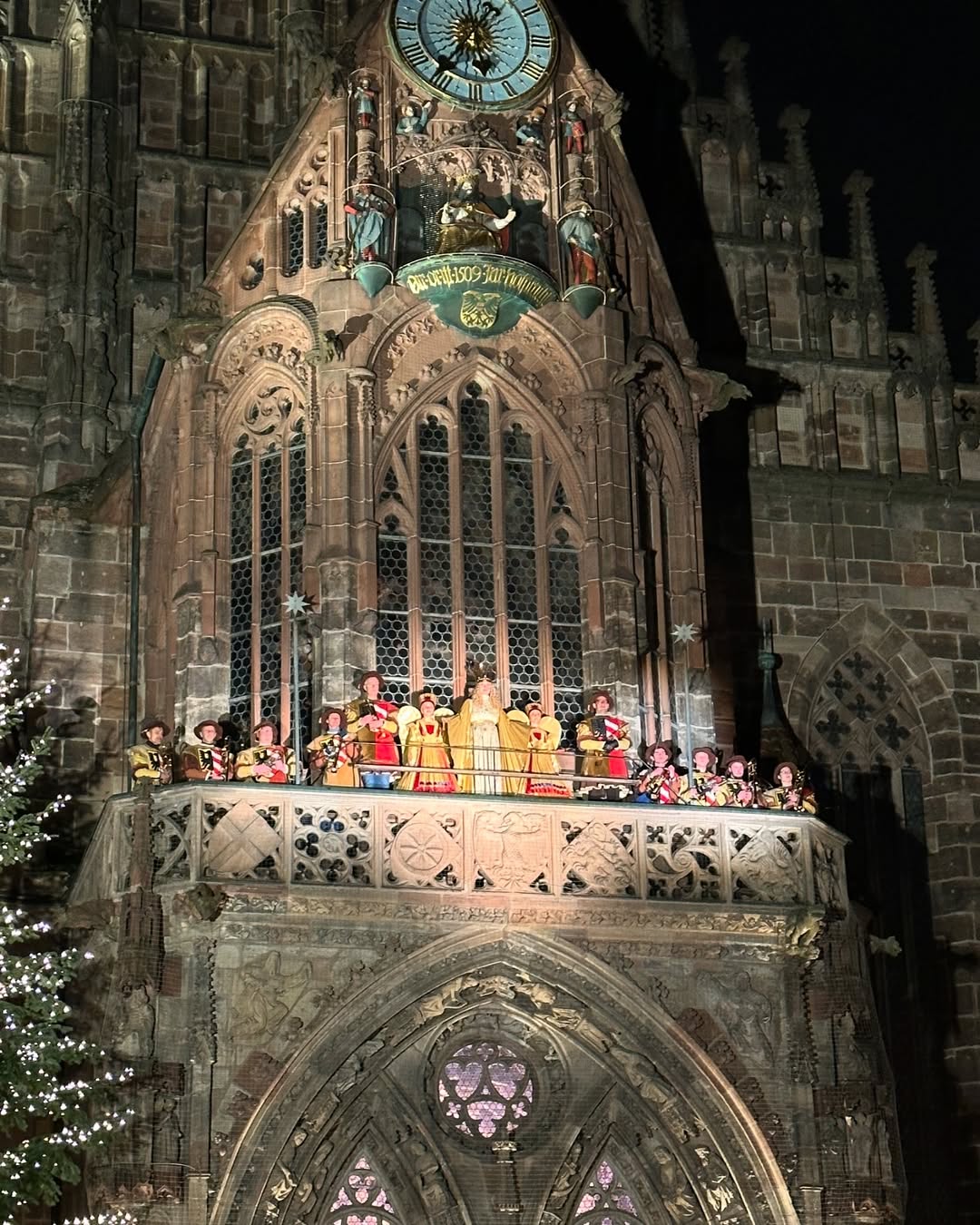 “Christkind,” dressed in gold, blesses the market from the church balcony in Nuremberg