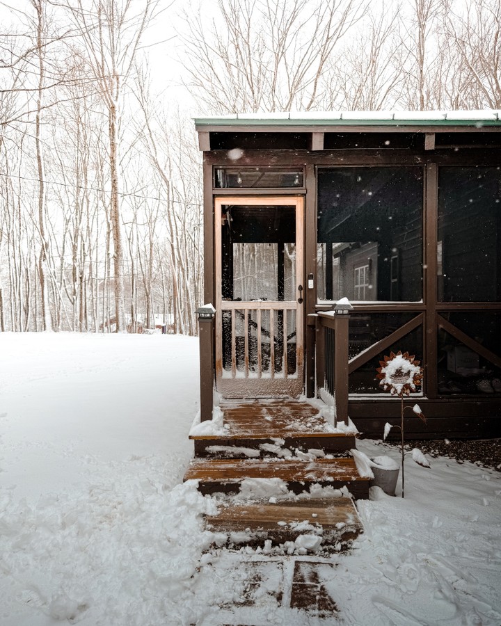 Enjoying the peak of winter in a snowy cabin