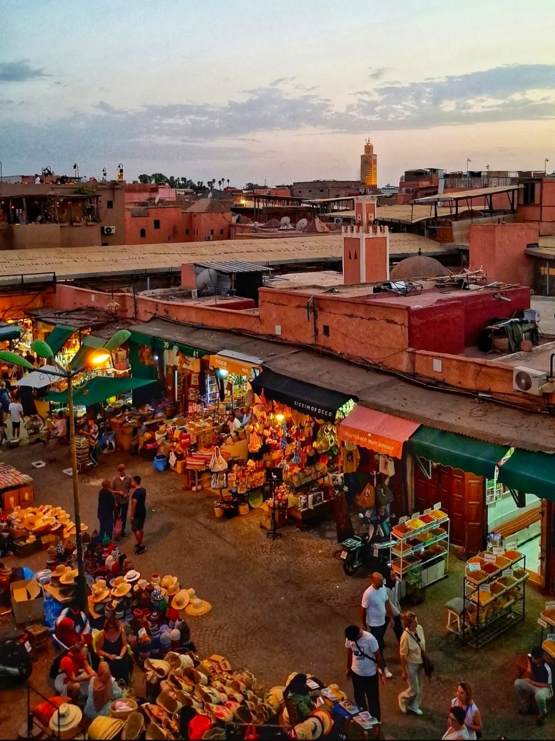A bustling market square in the medina quarter of Marrakech, Morocco